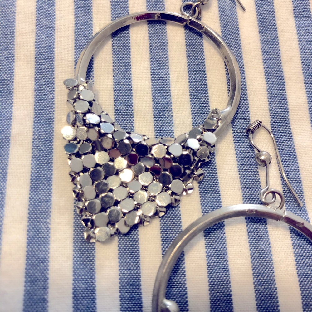 Dangling earrings.